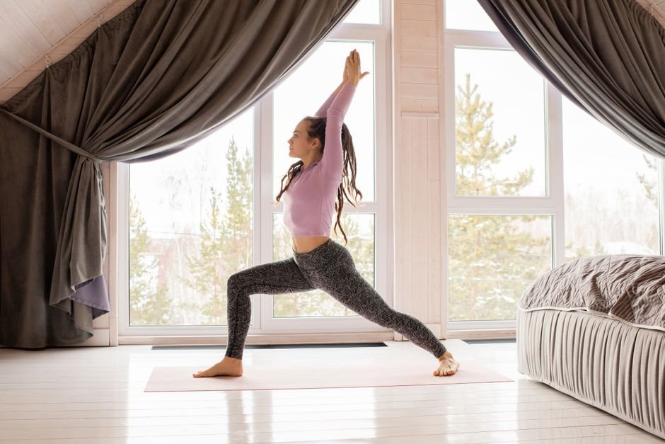 woman morning stretch window