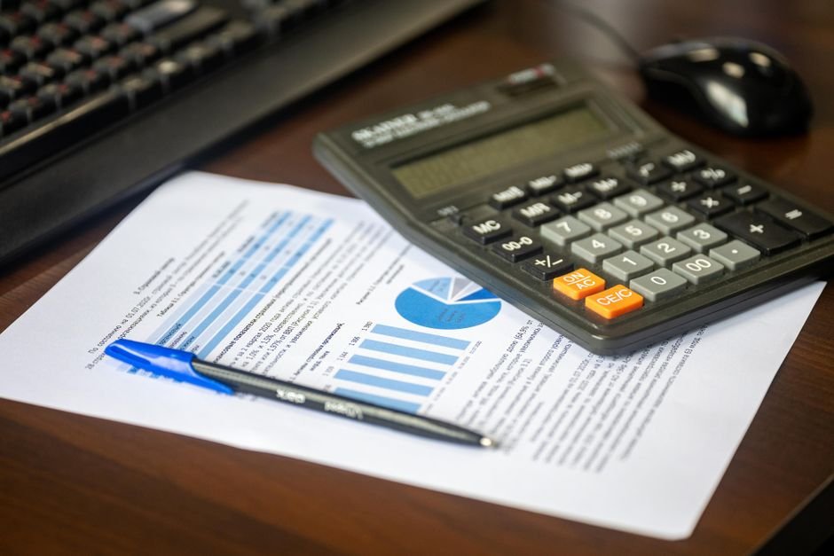 documents and calculator desk